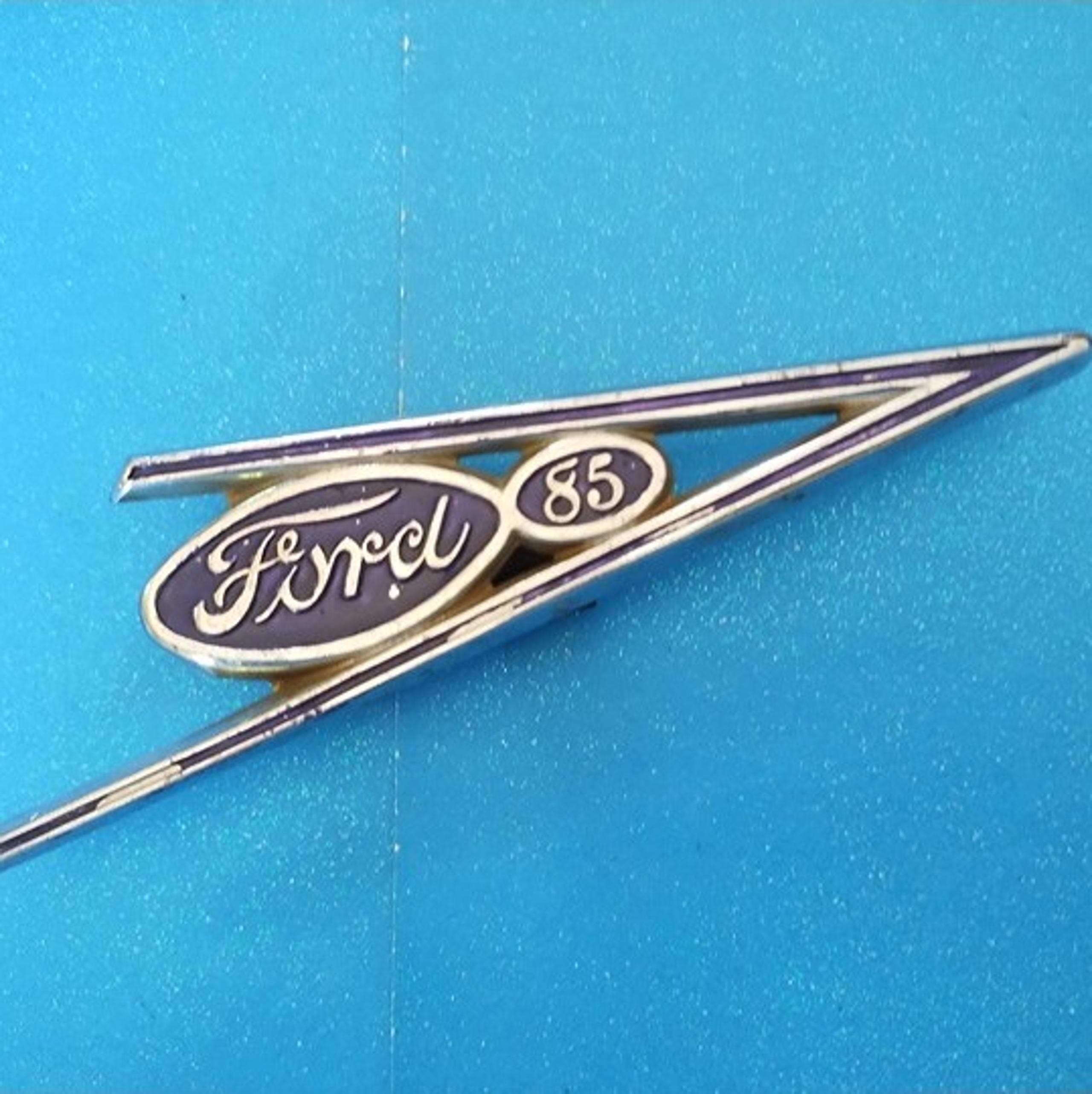 Used Vintage 1937 Ford V8 85 HP chrome and blue grille emblem