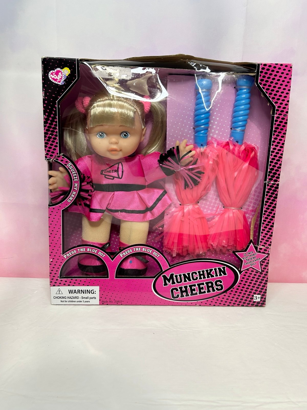 Blonde pink munchkin cheers doll with child pom poms