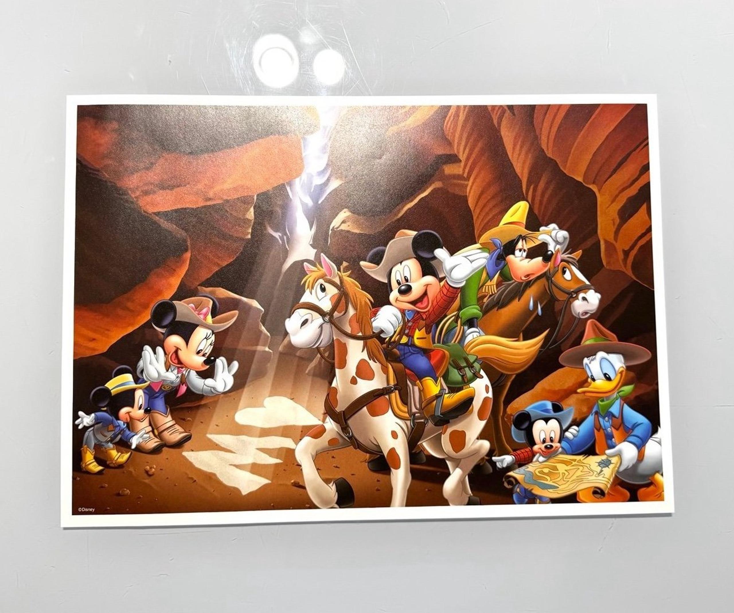 Mickey and friends exploring a Western Valley