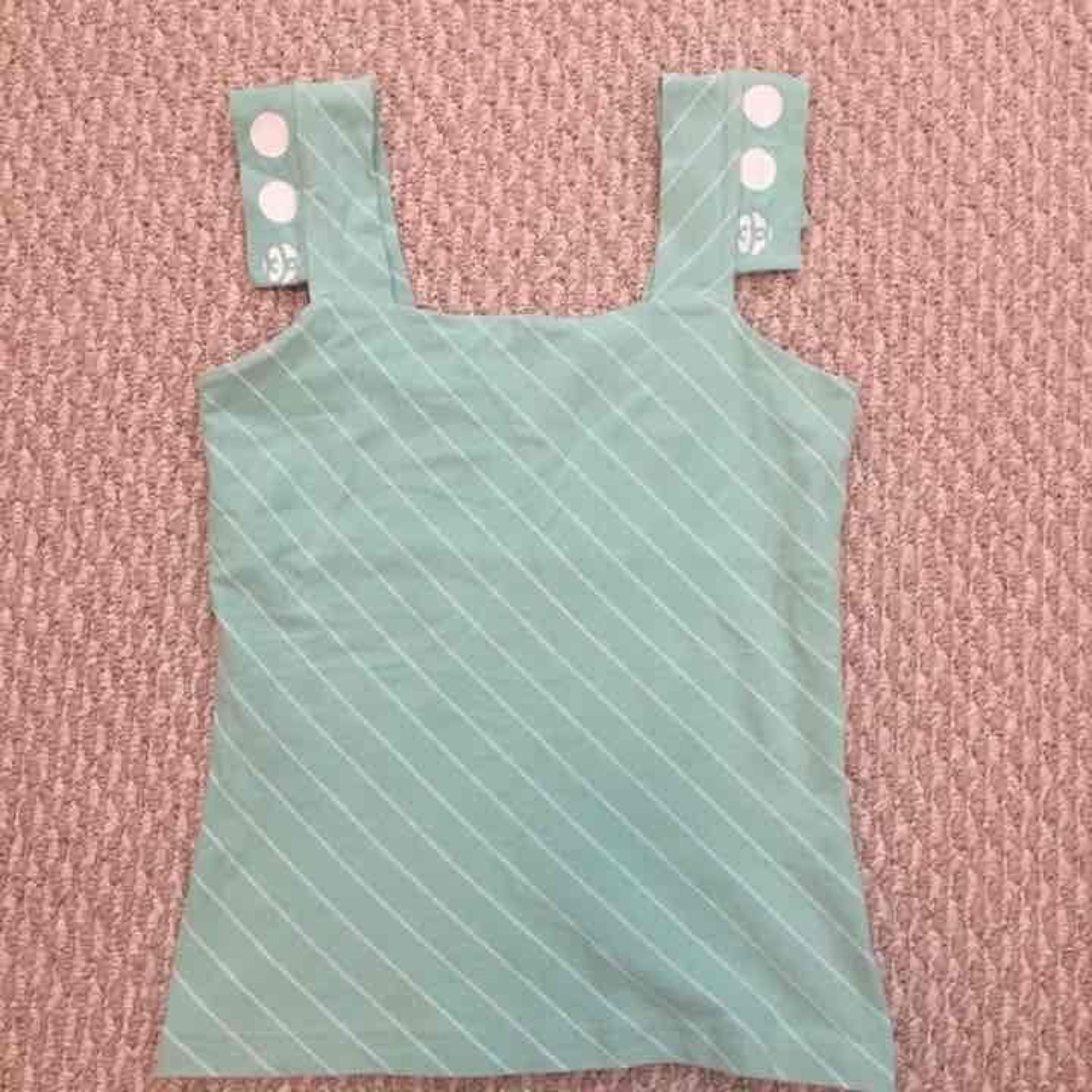 Stussy top. Sea green mint color. Small