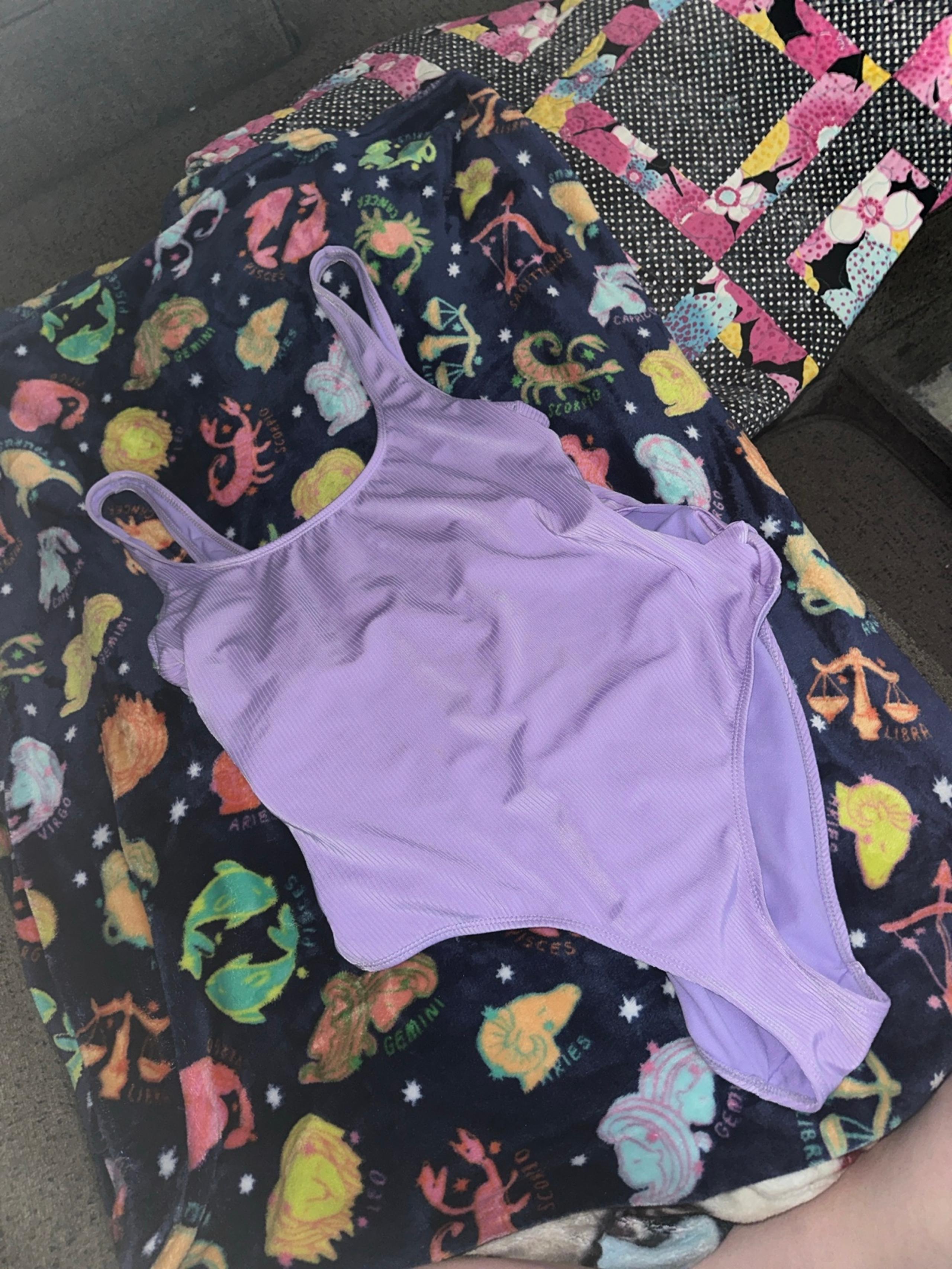 No boundaries XXL purple one piece with side cut outs bow design
