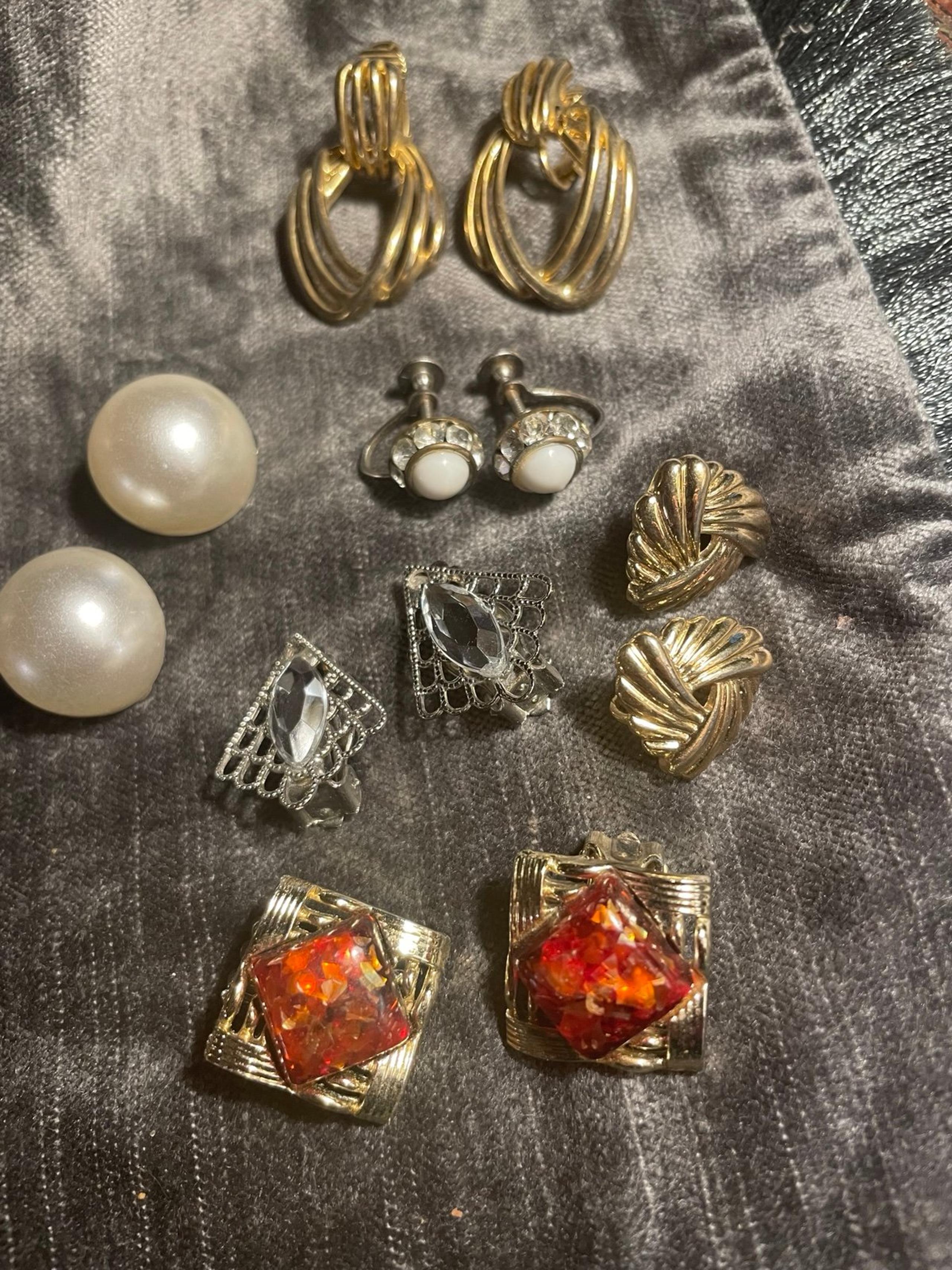 Lot of 6 pair vintage clip on earrings. One marked Coro