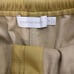 SIMKHAI Doah Faux Leather Drawstring Shorts Size M Yellow
