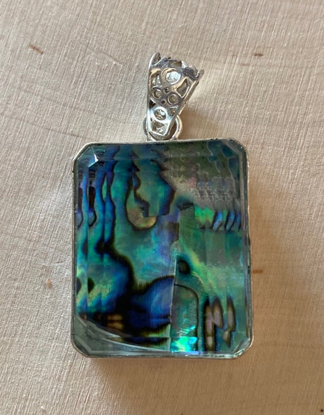 Natural 71 carat, Emerald cut, Ammonite set in 925 Sterling Silver
