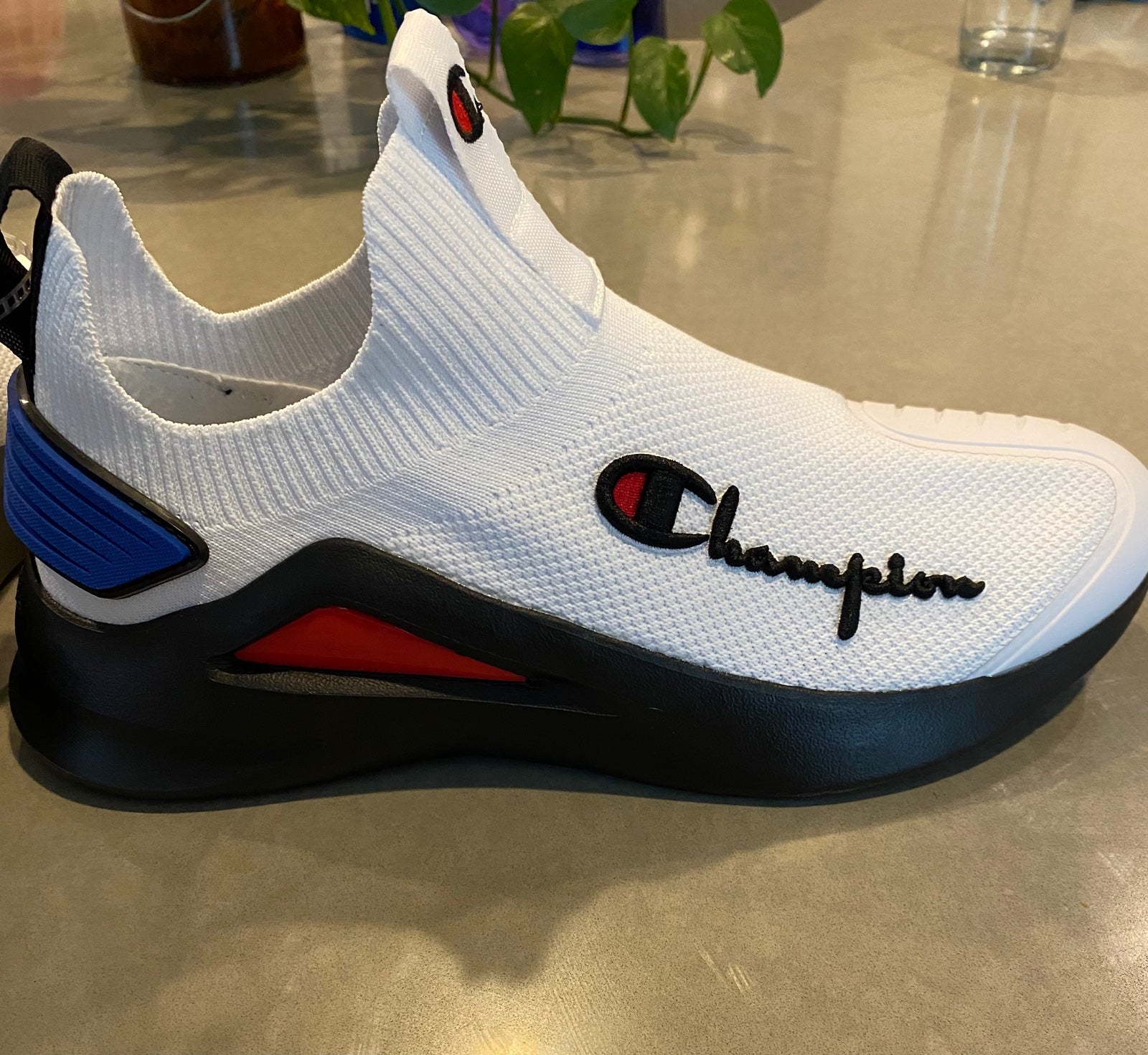 White Champion Slip on high tops