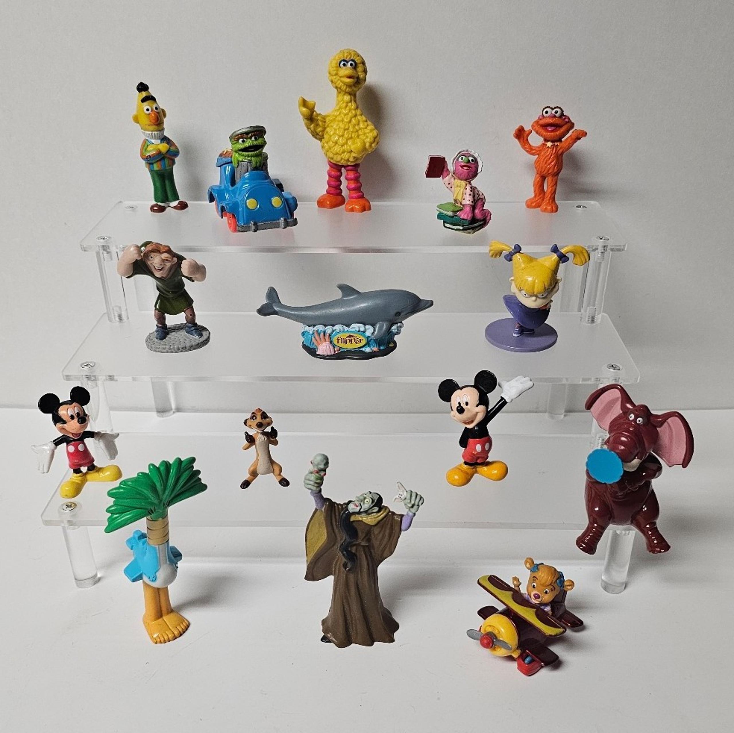 Sesame Street, Disney, Nickelodeon, TaleSpin, and more collectable figures