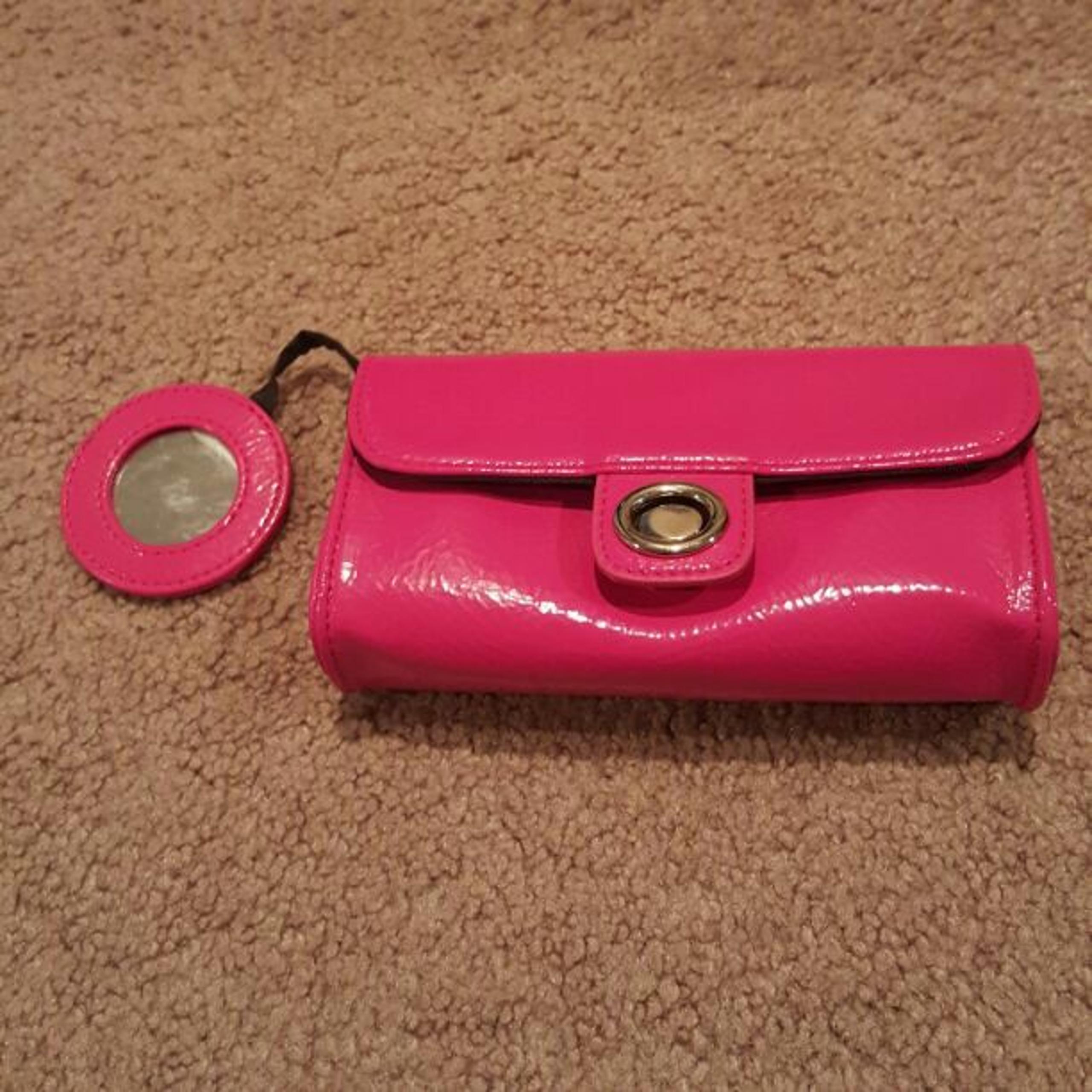 Hot pink makeup bag