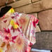 Hurley pink yellow tropical body swimsuit NWT Small