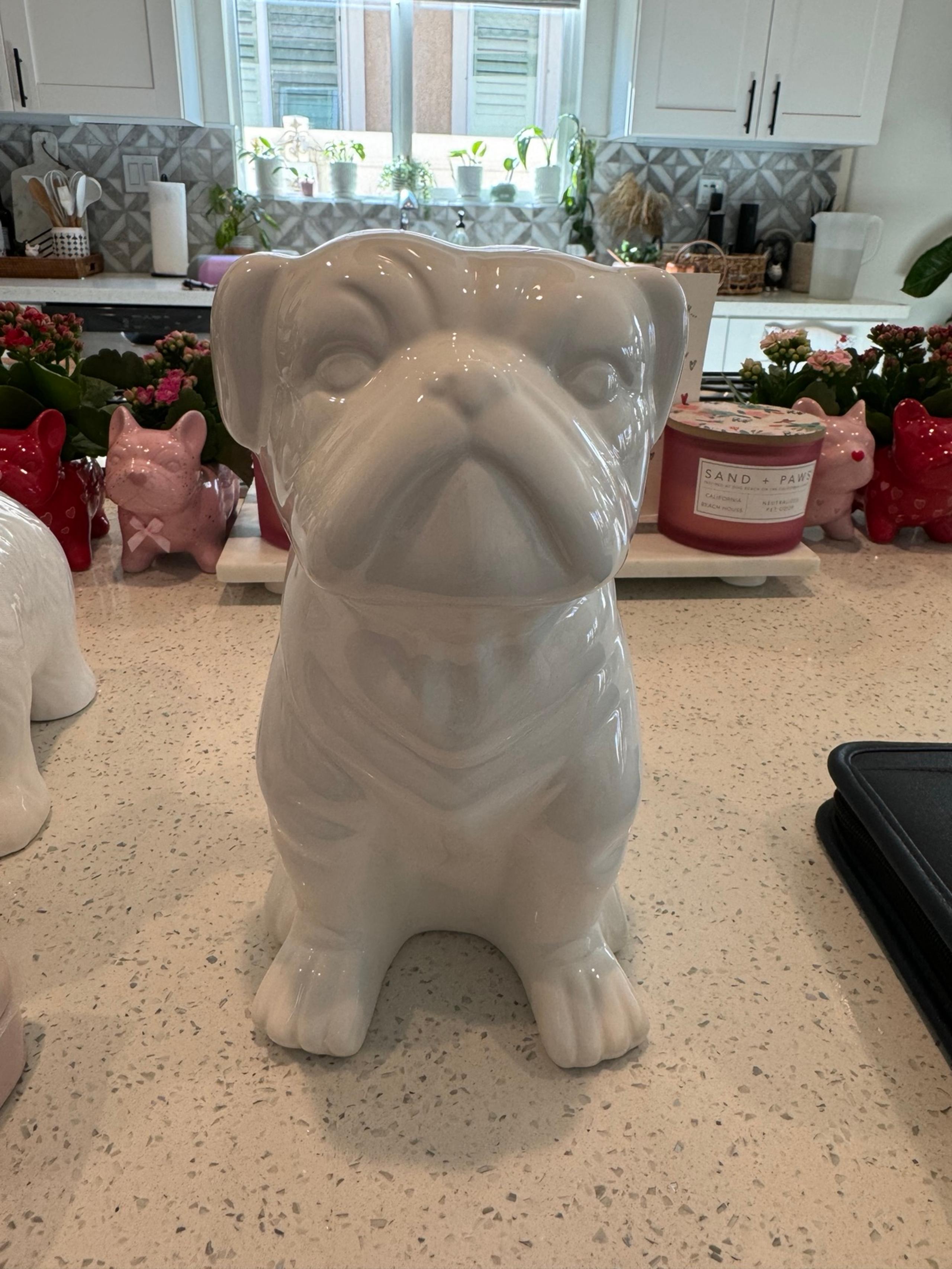Large white ceramic pug statue