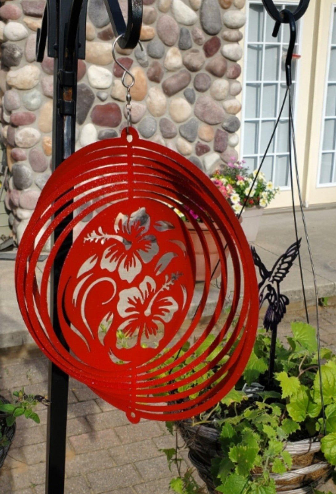 Metal hibiscus spinner