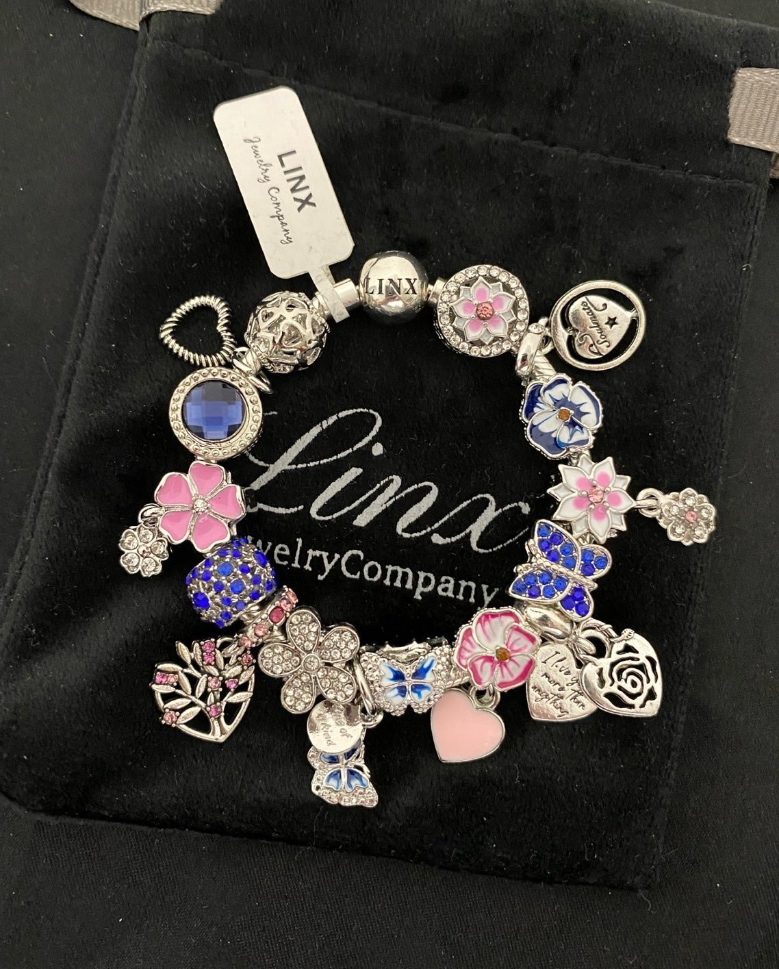 Linx Bracelet with Pink and Blue Butterfly and Flower Themed Charms