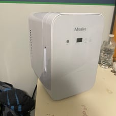 Portable mini fridge/heater
