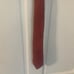 Hermes Light Red Silk Tie with Gray Belt Buckle Pattern