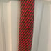 Hermes Light Red Silk Tie with Gray Belt Buckle Pattern