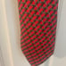 Hermes Light Red Silk Tie with Gray Belt Buckle Pattern