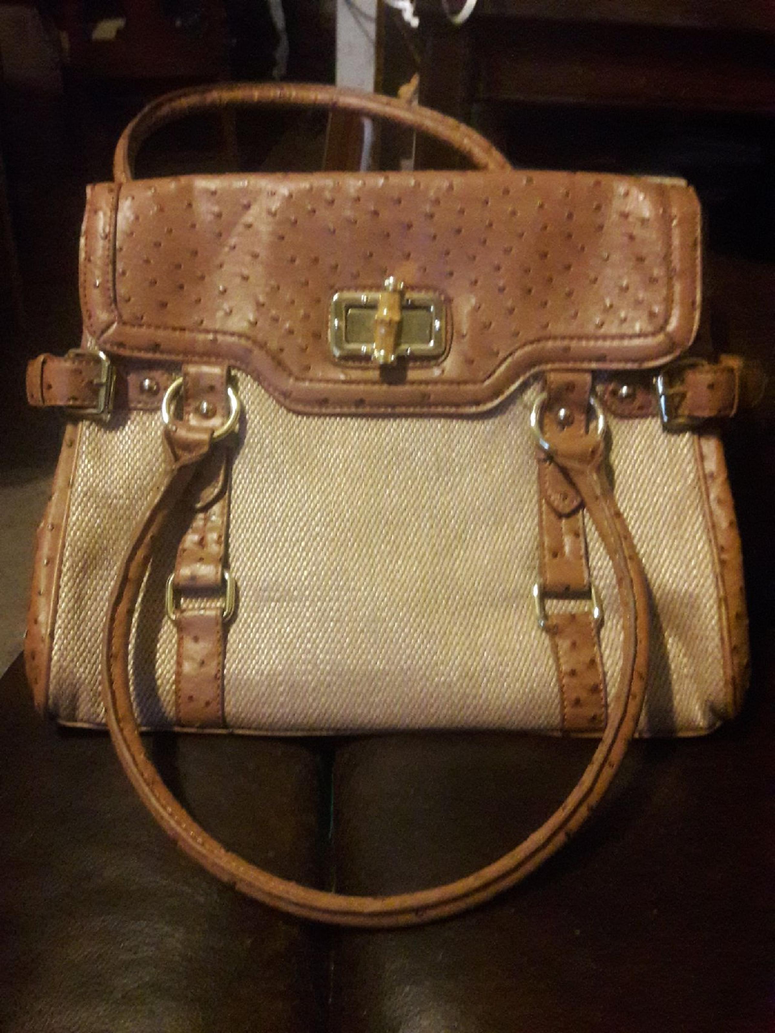 ALDO handbag with turn key locket