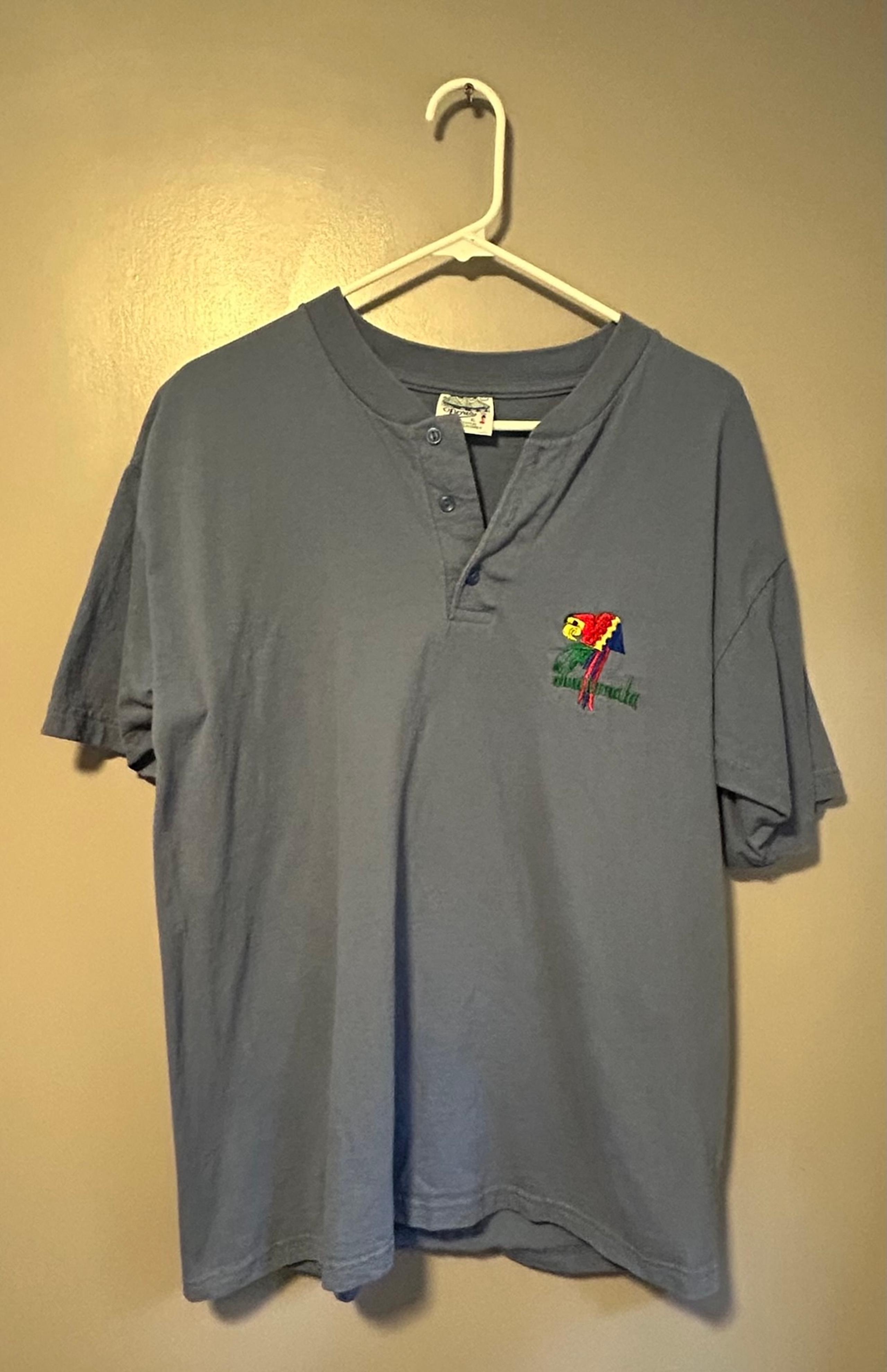 Blue colored Doris brand vintage parrot design button neck T shirt