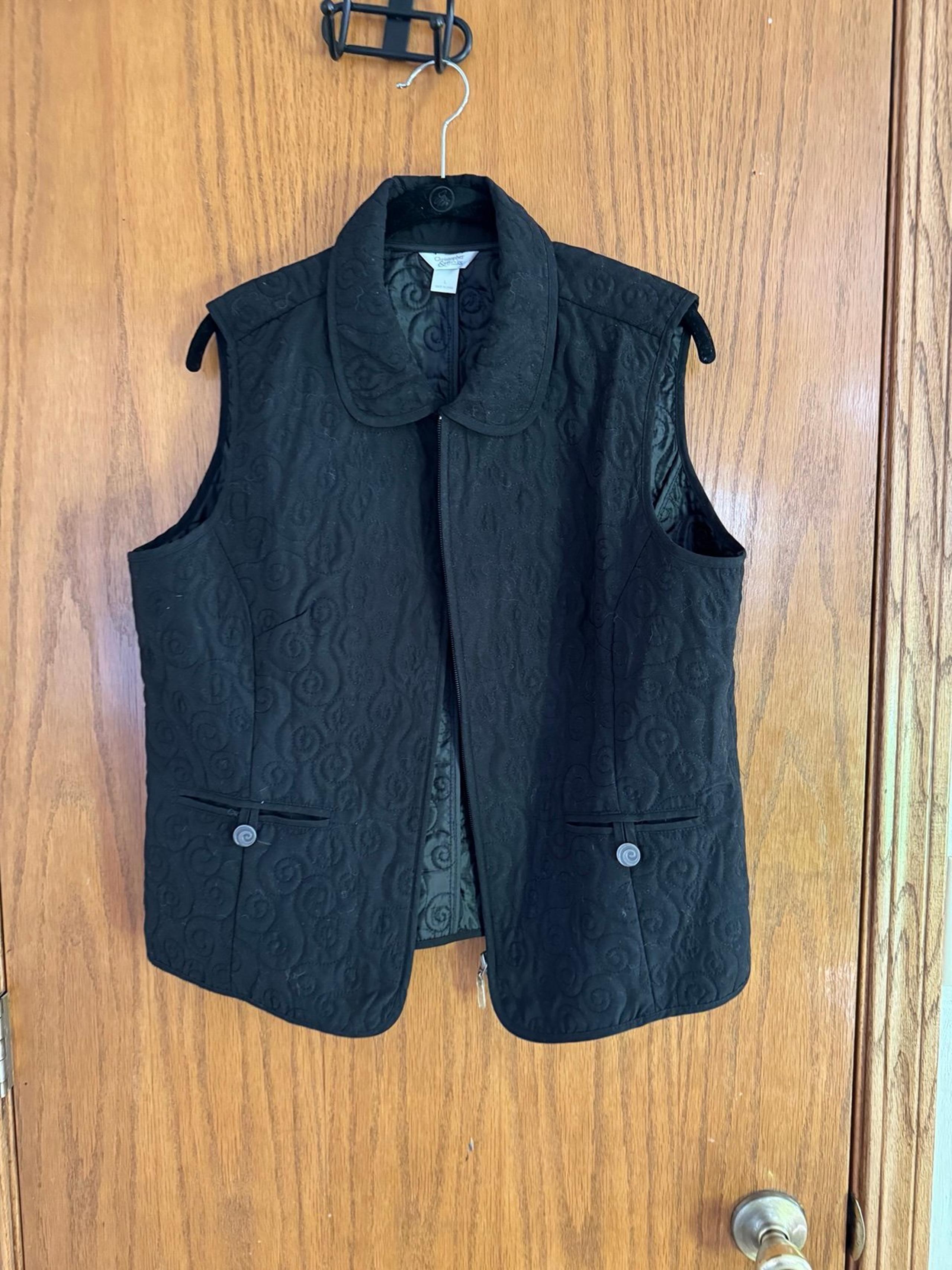 Women’s black stitched  vest