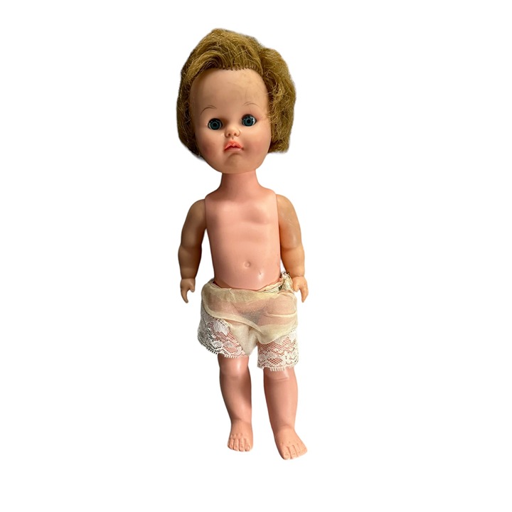 Vintage doll in poor condition, 1965
