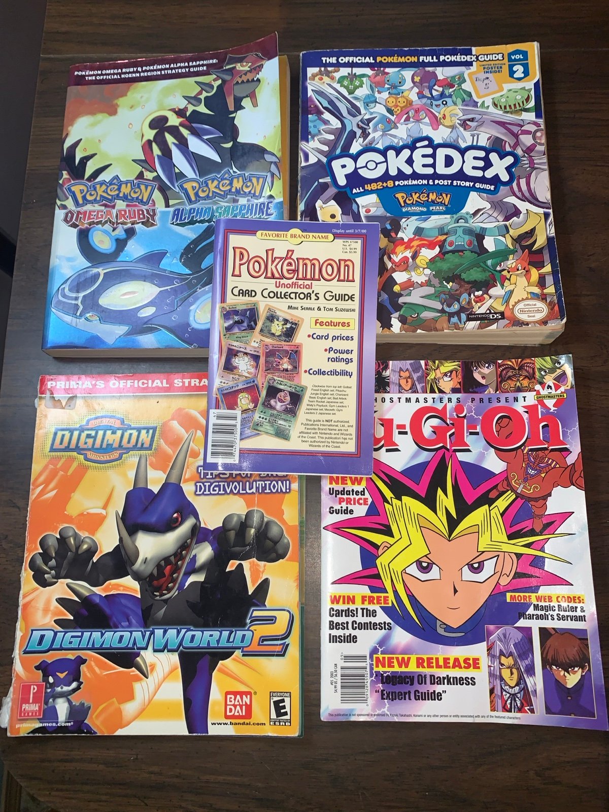 POKEMON Omega Ruby+ Alpha Saphire Strategy Guide+ Pokédex + Yugioh+Digimon Lot