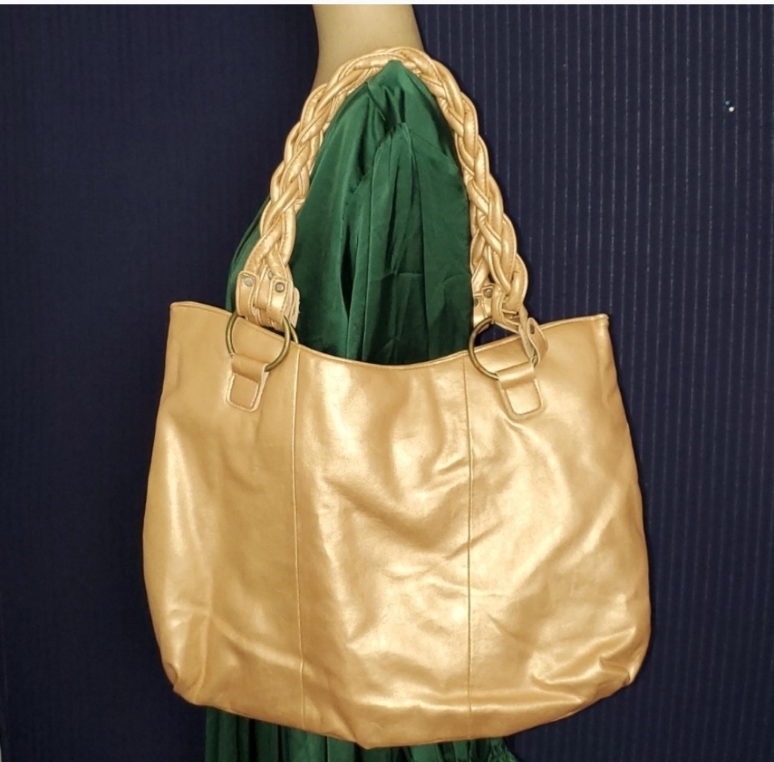 Signature Club A Tote bag Handbag 
Color gold/Tan
1