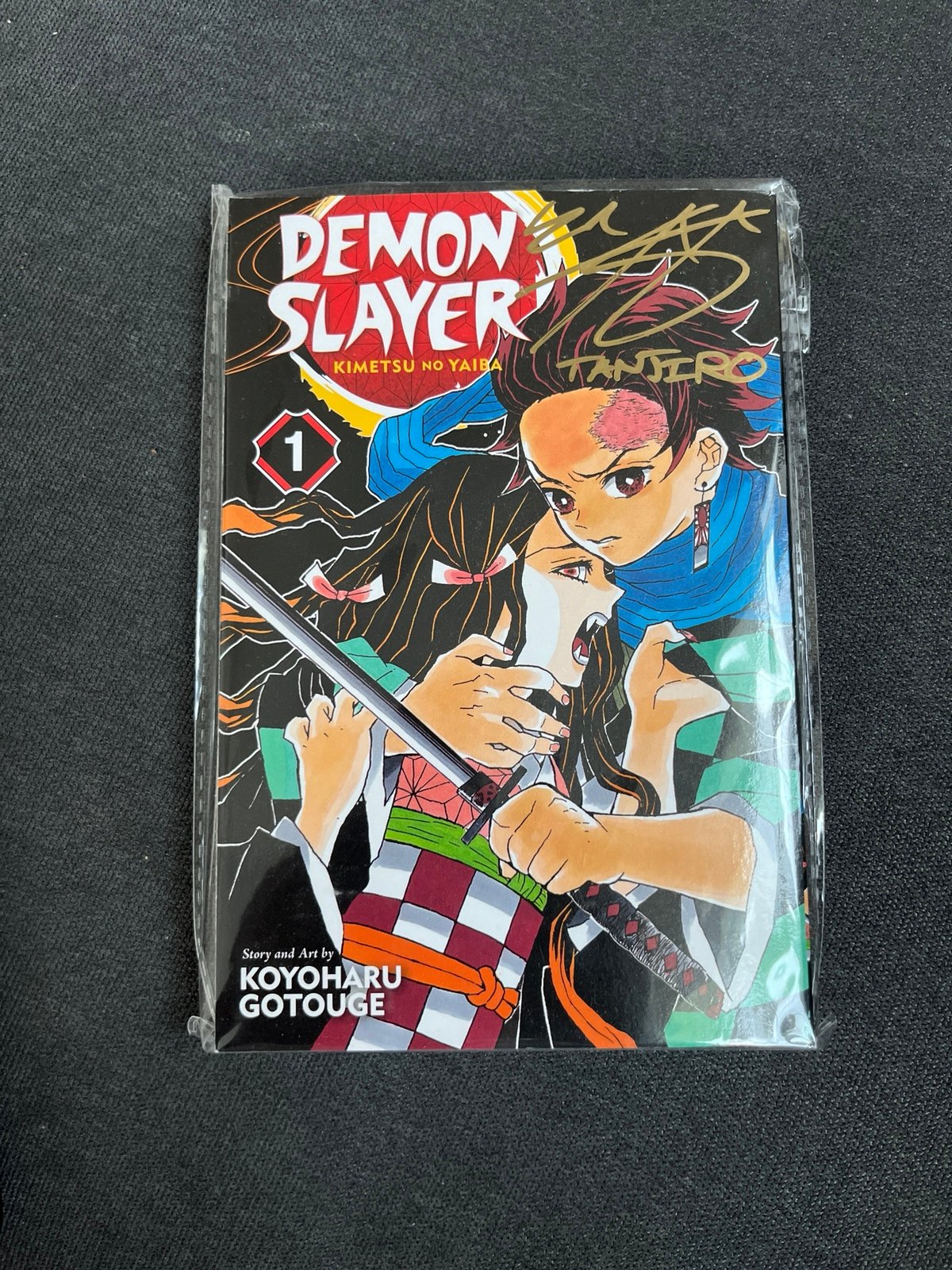 Autographed demon slayer manga