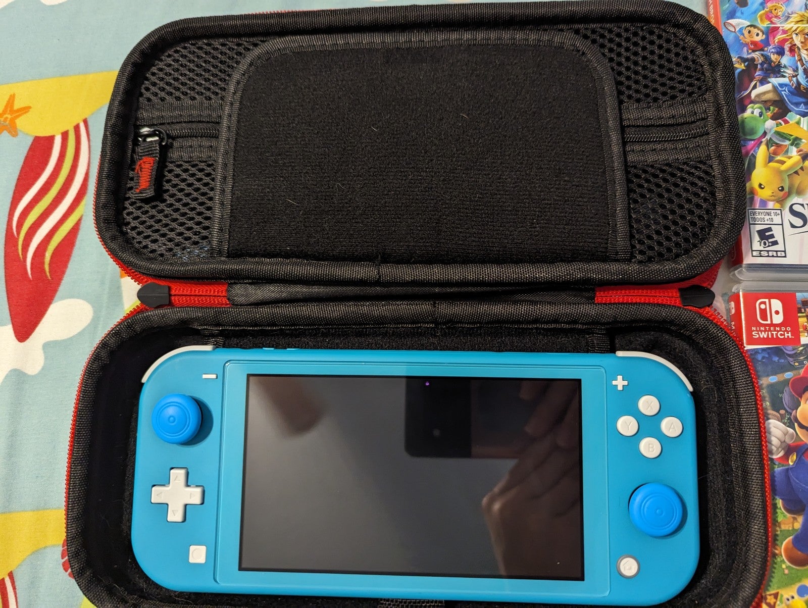 Nintendo Switch Lite plus 4 Games Pokemon Mario Smash Bros Sonic Like New