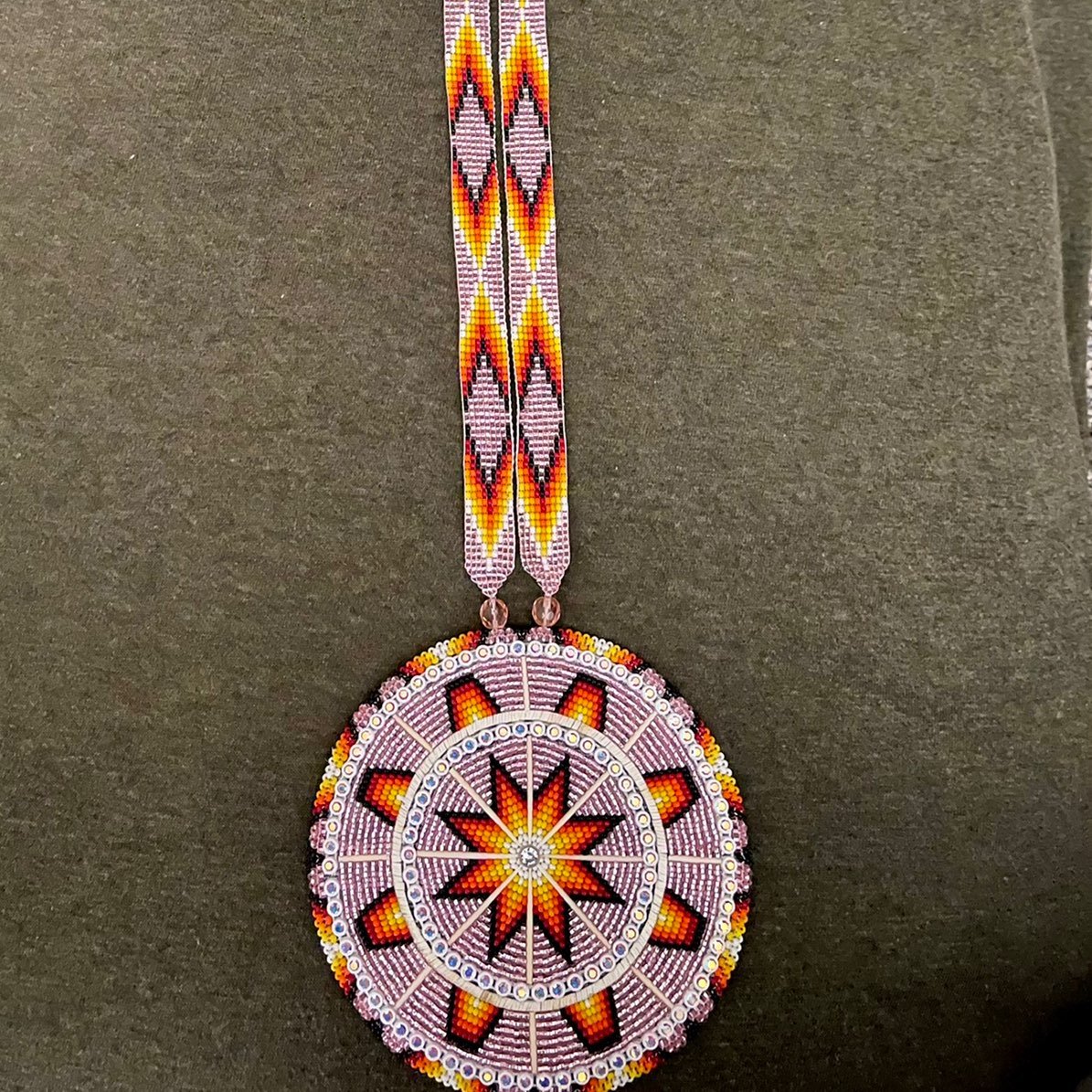 Pink beaded medallion