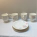 Mikasa Swiss Garden footed mugs and dessert plates