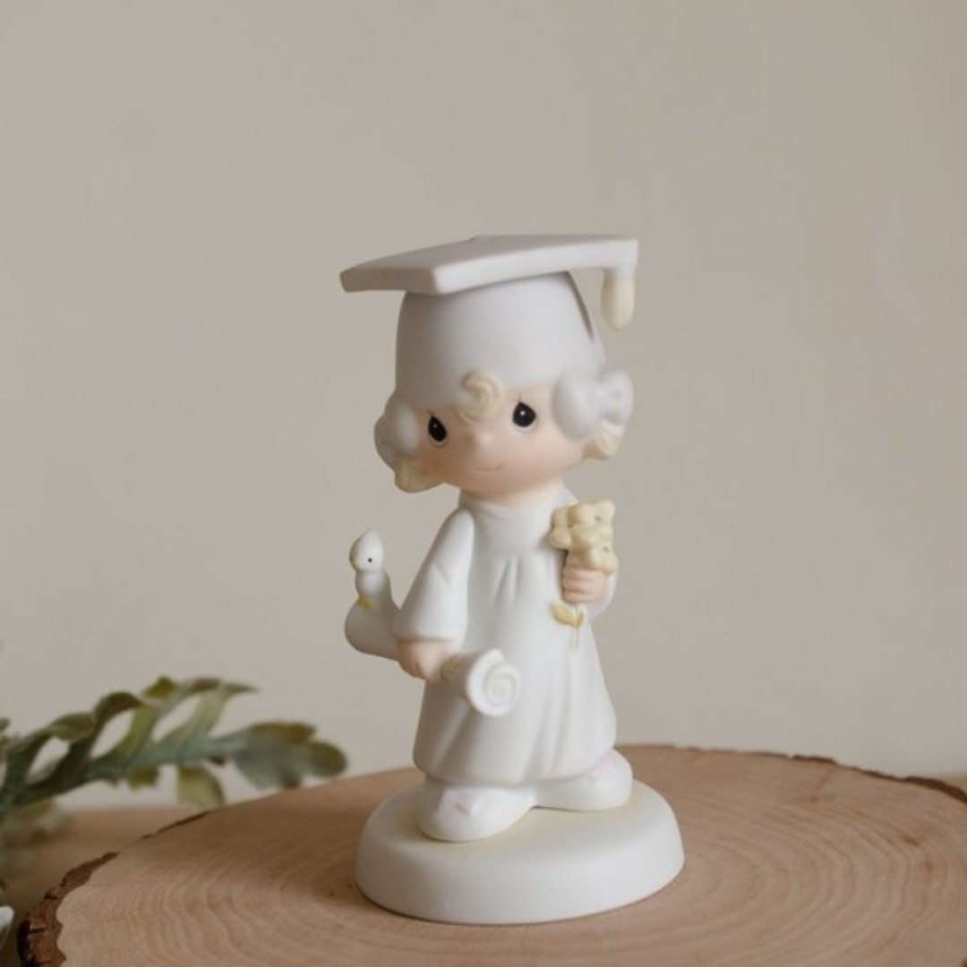 Precious Moments Graduation girl school figurine.