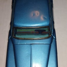 Vintage 1962 Plymouth Valiant Friction Tin Car