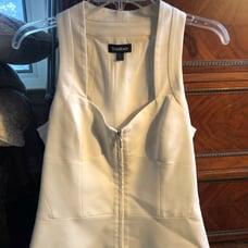 BEBE off White zipper front top size med
