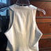 BEBE off White zipper front top size med