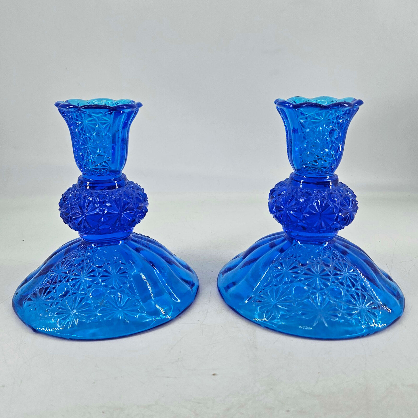 Vintage pair of Fenton Blue Daisy And Button Pattern Candle Stick Holder