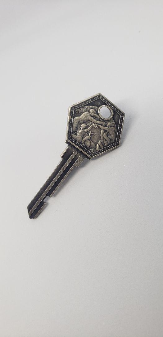 Octagonal Carved Key Motif Tie Pin