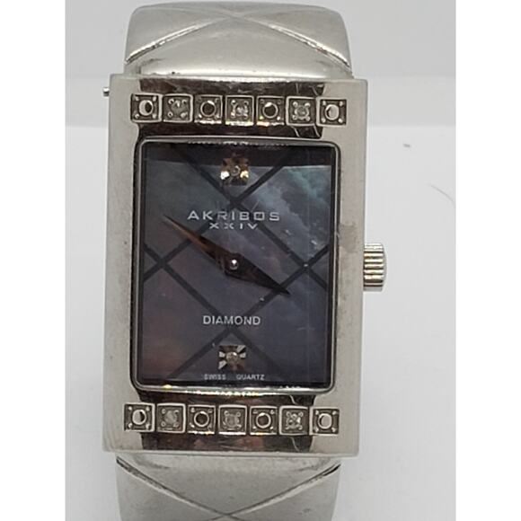 Akribos XXIV women's dress watch. Blue opalescent face. AK467BK. Working Watch