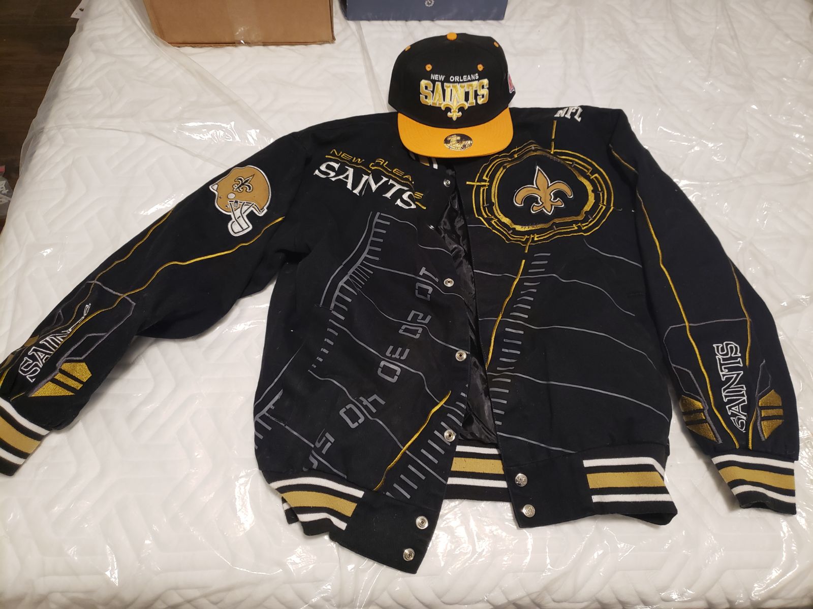 Saints NFL jacket and hat