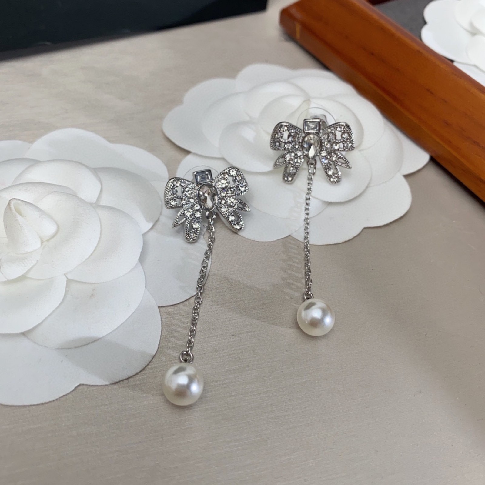 Long bow earrings