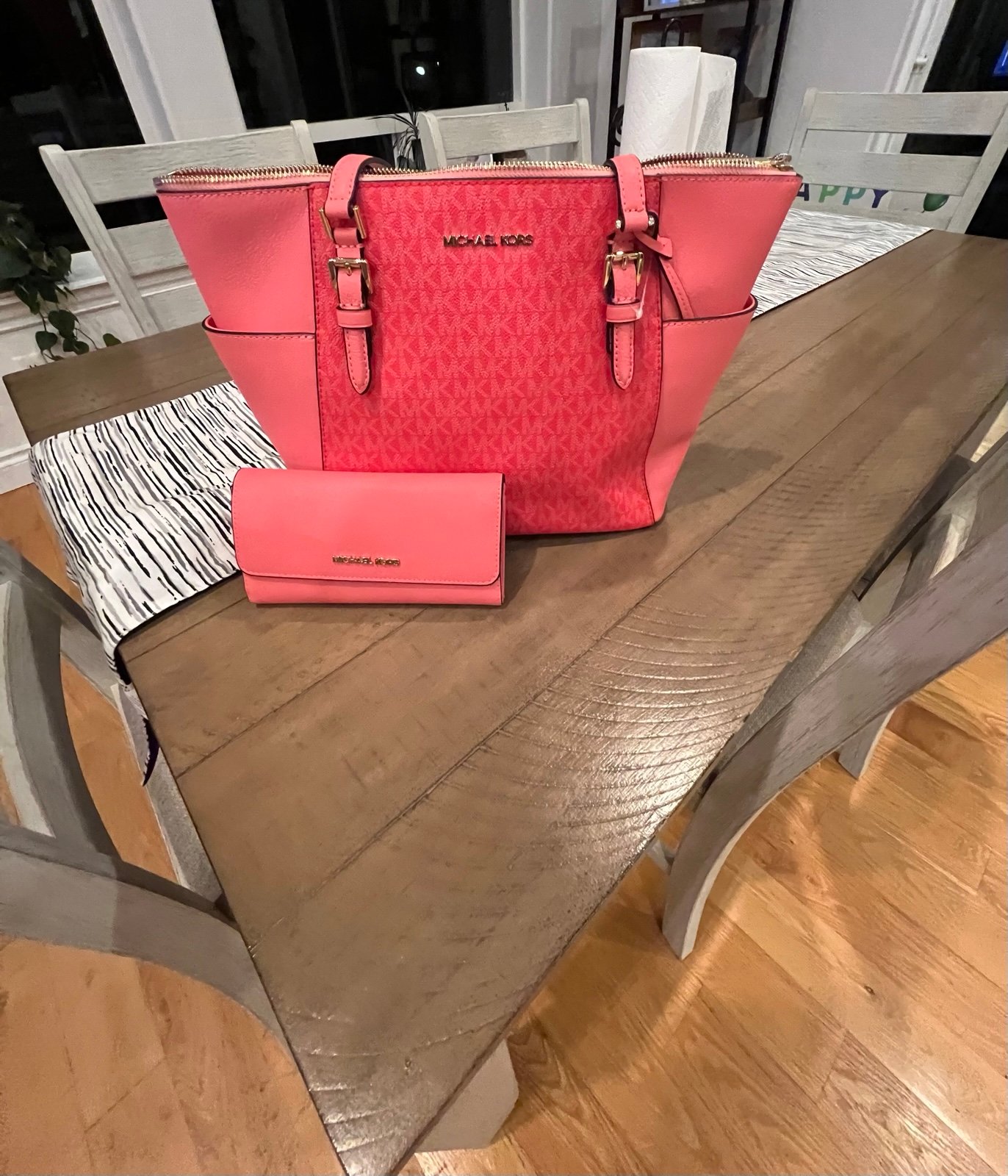 Bright pink Michael Kors charlotte purse with matching wallet