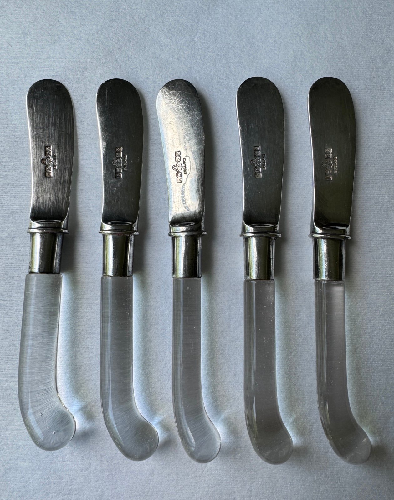 Five England EPNS Clear Glass Handled Butter Knives