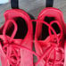 The **RARE Nike Air Max Motion 2 Men's Shoes** in **Red and Black**, size 11.5