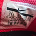 The **RARE Nike Air Max Motion 2 Men's Shoes** in **Red and Black**, size 11.5