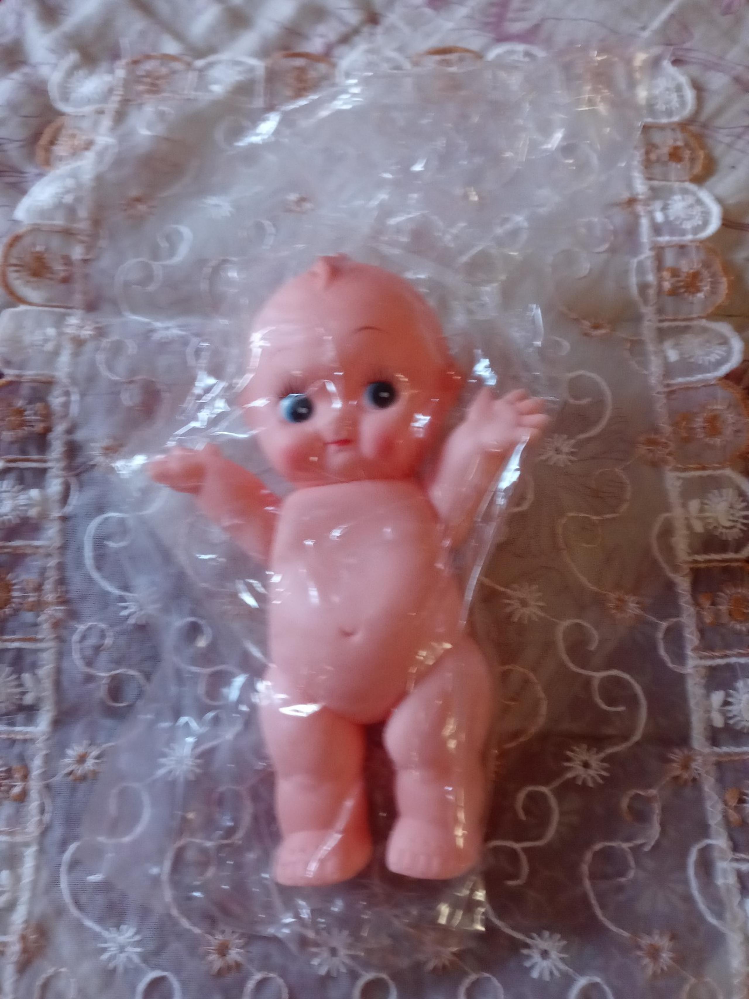 Vintage plastic blue eyed Kewpie doll made in Korea new