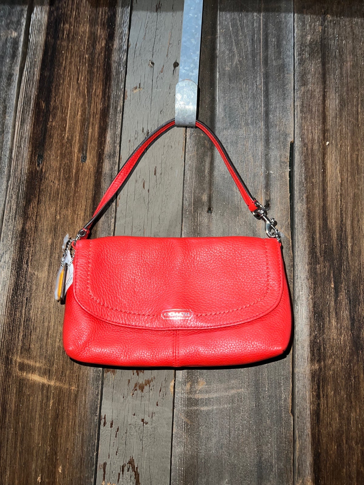 Coach Parker wristlet orange mini