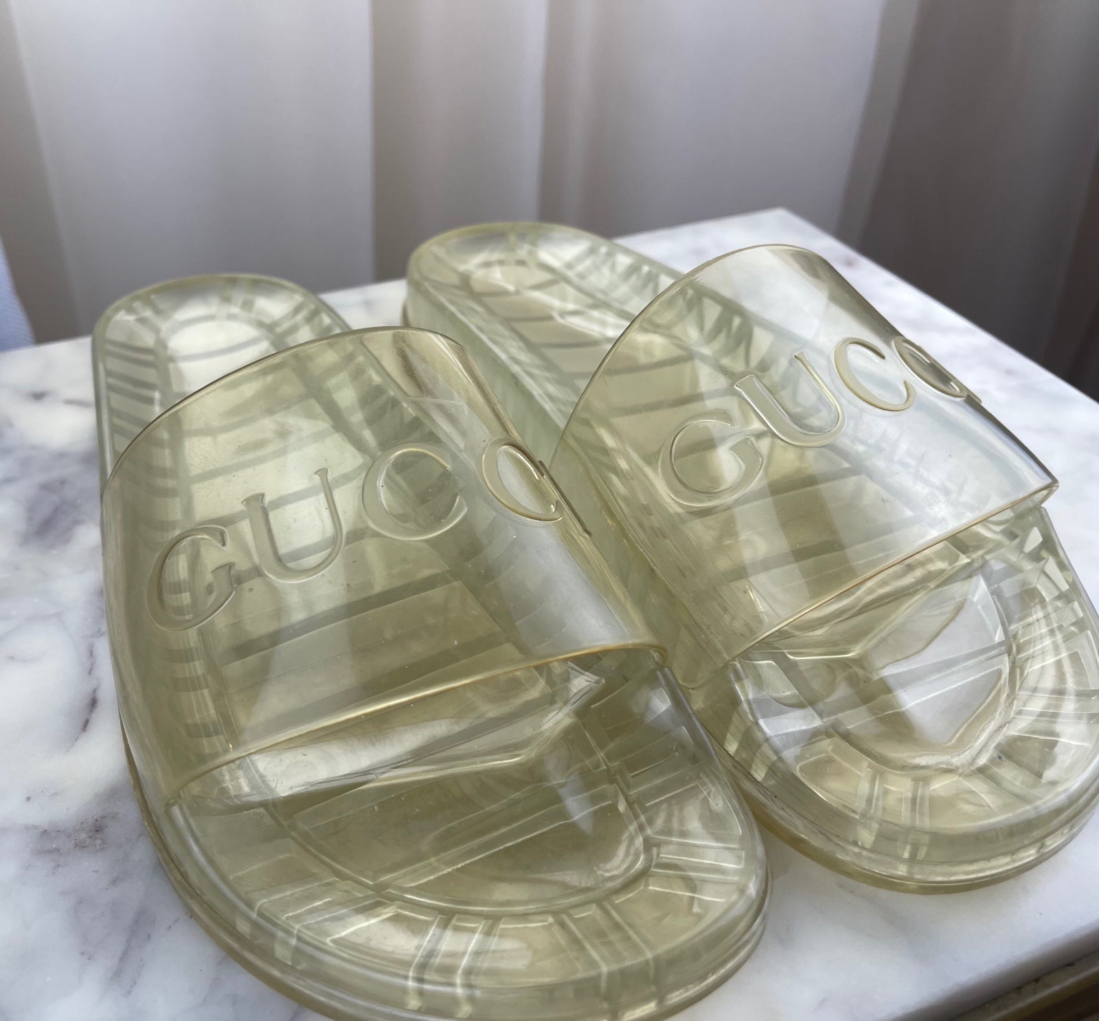 Clear store gucci slides