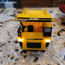 RARE VINTAGE CATERPILLAR TOY DUMP TRUCK