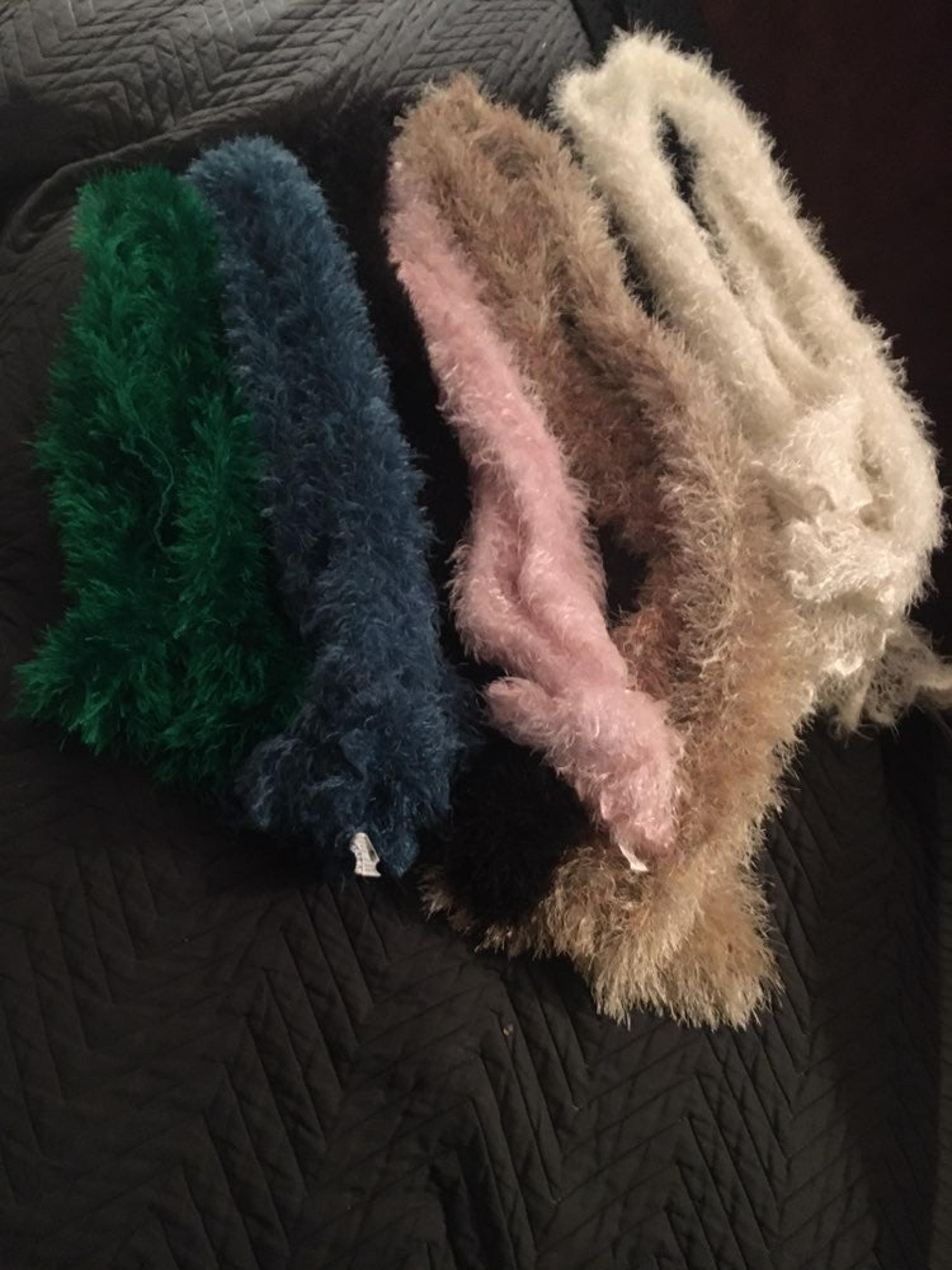 Six fuzzy knit scarves