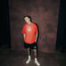 SEED OF DARCNESS PREMIUM OVERSIZED UNISEX TEE IN ROMAN RED TONAL SUN FADE