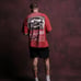 SEED OF DARCNESS PREMIUM OVERSIZED UNISEX TEE IN ROMAN RED TONAL SUN FADE
