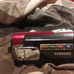 Red and black camcorder that comes with
